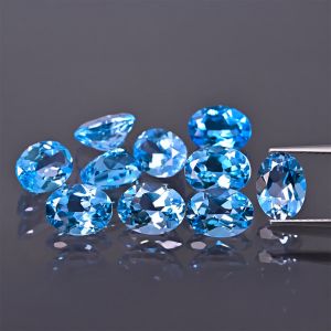 Pierre ovale, cône - topaze bleu Swiss 7x5 MM